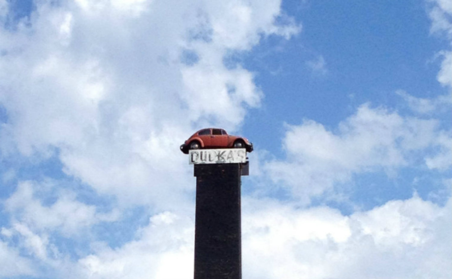 Dudka's VW on a Smokestack in Amsterdam, NY - Featured Image