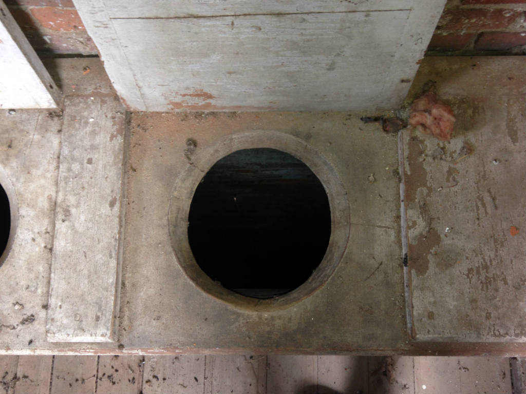 Toilet Seat in the Second Floor of Two Story Brick Outhouse in Phelps, NY