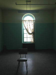 Single Chair in a Room within the Grandview Building at the Willard Asylum near Seneca Lake