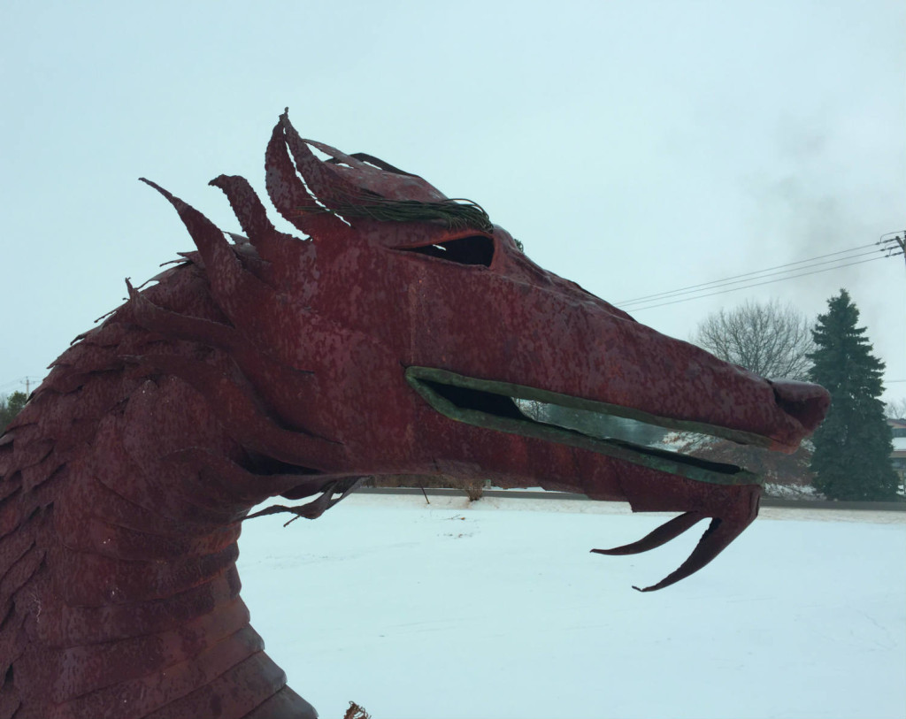 Closeup of the head of the metal dragon in East Bethany, NY