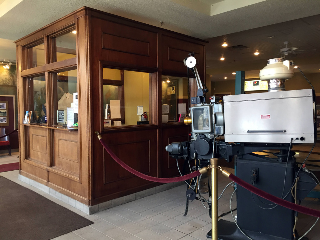 Historic Film Projector and Box Office in Lobby at the Aurora Theatre in East Aurora, New York