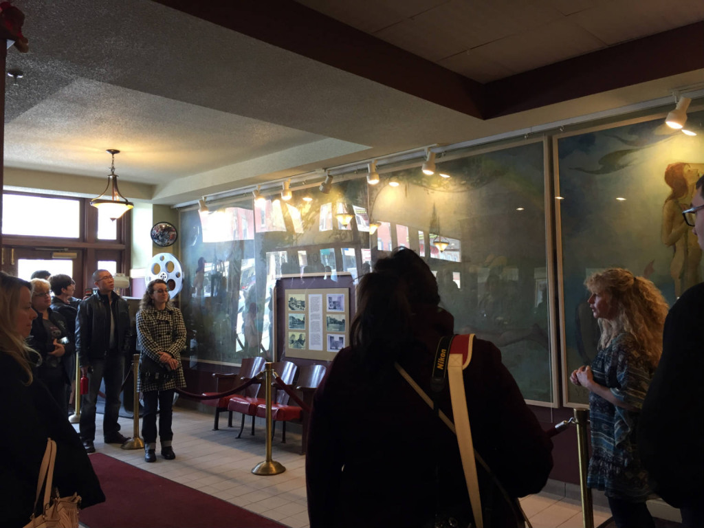 Lynn Kinsella Giving a Tour to the Buffalo Instagram Group in the Aurora Theatre Lobby in East Aurora, New York