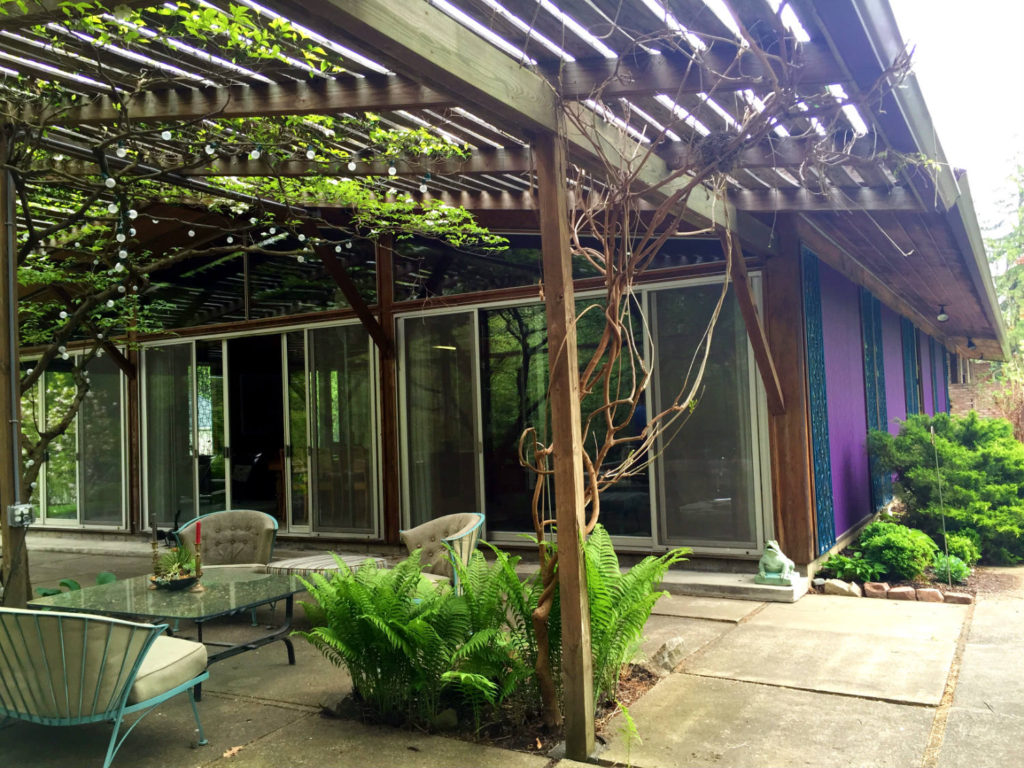 Patio and Exterior Paneling on Alcoa Care Free Home in Rochester, New York