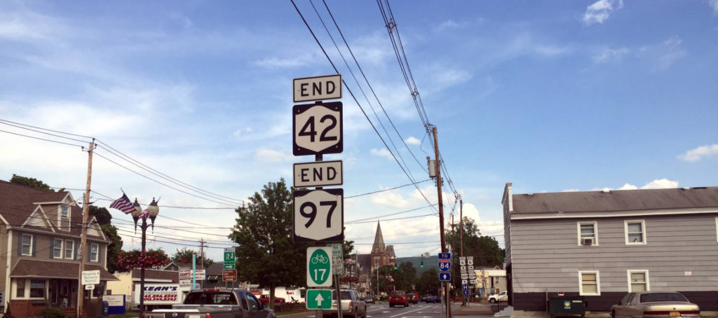 New York State Route 97 signs in Port Jervis, New York