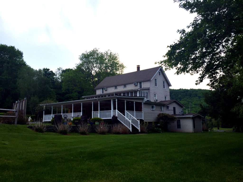 House and Porch at Lazy Pond Bed and Breakfast in Liberty, New York