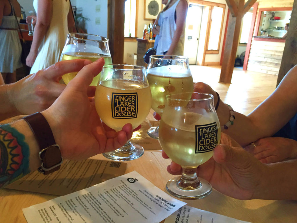 Cheers at Finger Lakes Cider House in Interlaken, New York