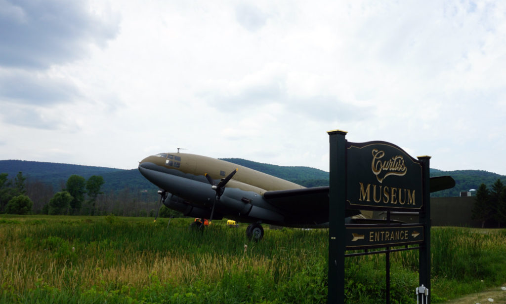 Outside the Curtiss Museum with Welcome Sign