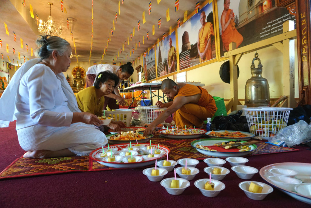 Preparing The Offering at the Wat Pa Lao Buddhadham in Henrietta, New York