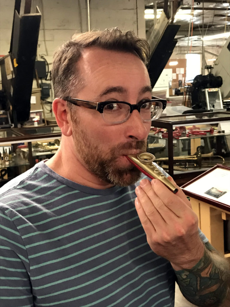 Chris Clemens Playing Kazoo at the Eden Kazoo Museum