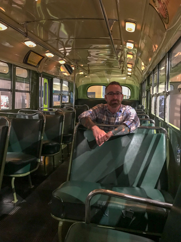 Chris Clemens Sitting on the Rosa Parks Bus at the Henry Ford Museum in Detroit, Michigan