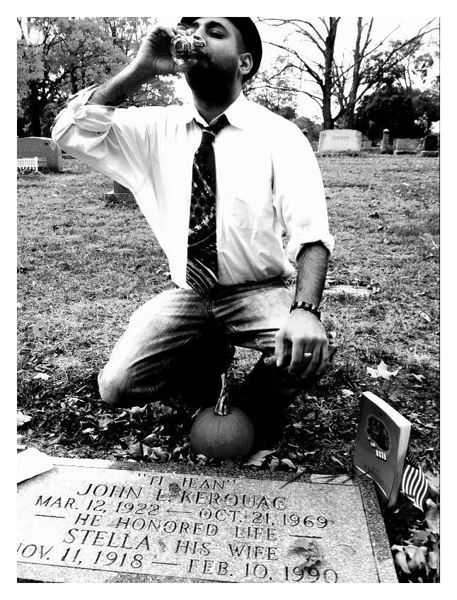 Sam Taking a Shot at Kerouac's Grave